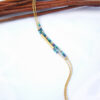 Bracelet doré à l'or fin perles Miyuki montées sur de fines chaines couleur bleu violet doré et vert